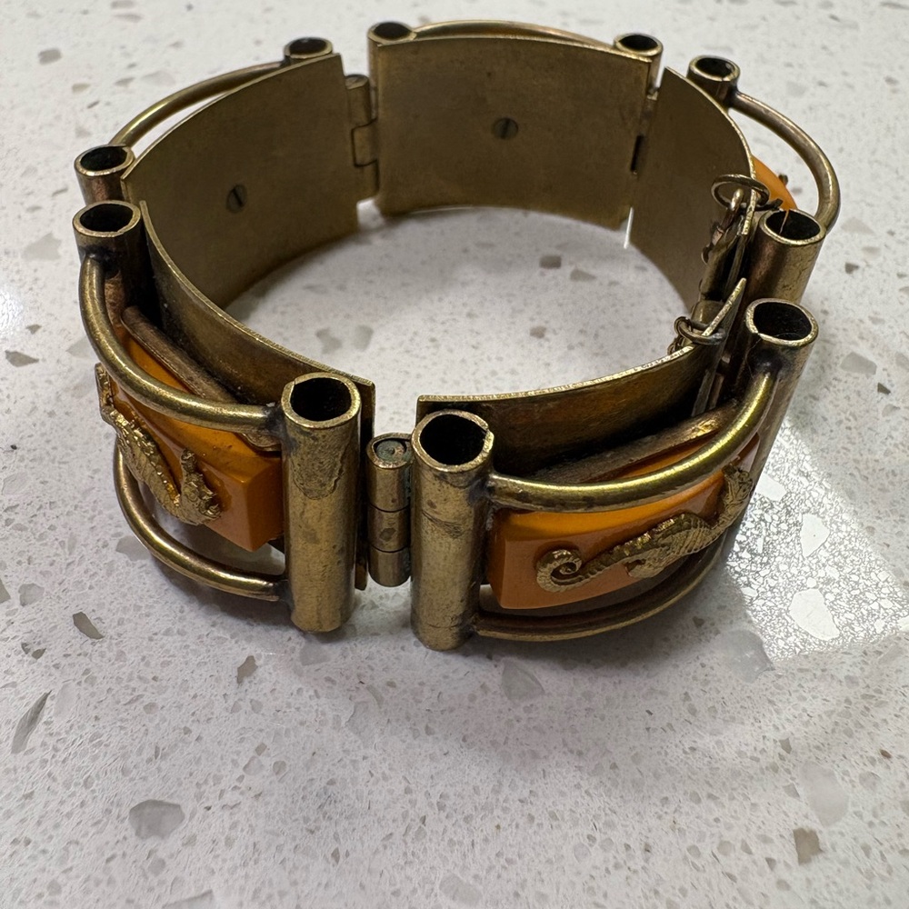 Antique Parisian Brass and Orange Bakelite Bracelet with Seahorse Design